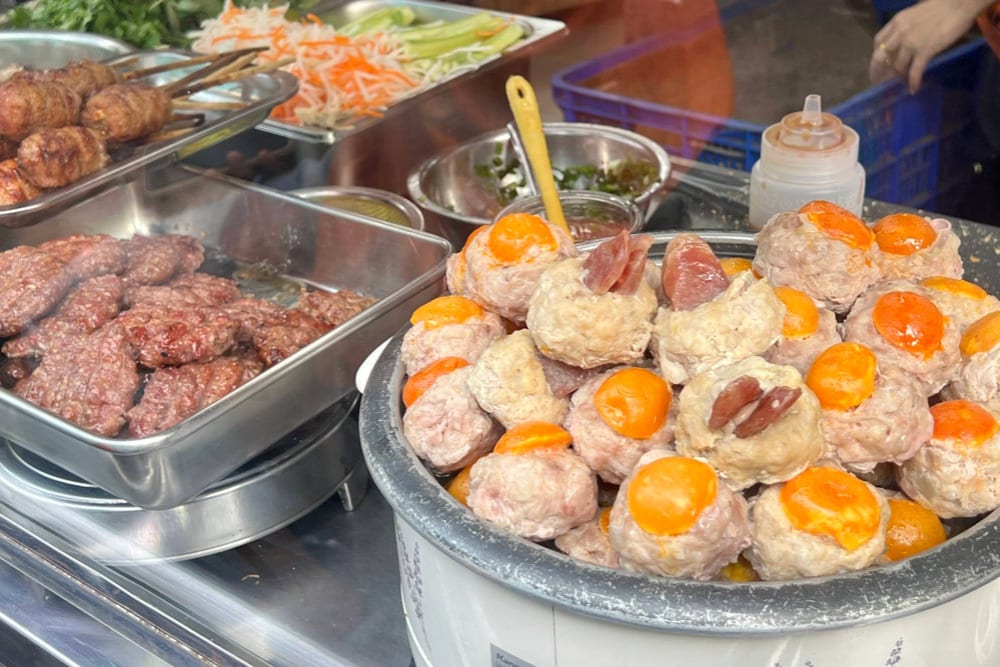 The must-try banh mi at Banh Mi Co Lanh is the exceptional meatball wrapped in salted egg - a true delicacy